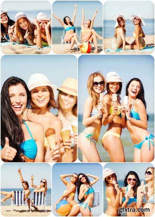 Girls in bikini with ice cream on the beach, girls sunbathing on the beach chairs - Stock photo
