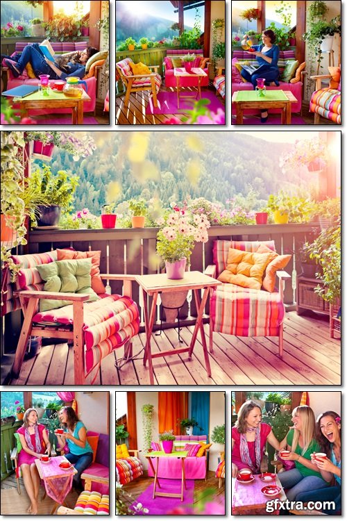 Young girls having rest over a cup of tea on a summer Terrace, balcony - Stock photo