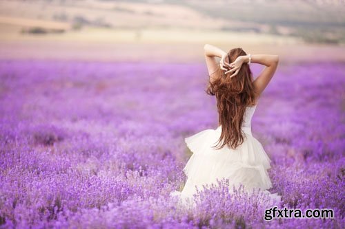 Stock Photo: Lace white wedding dress with long sleeves