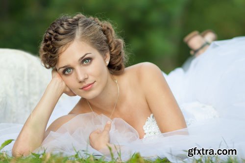 Stock Photo: Lace white wedding dress with long sleeves