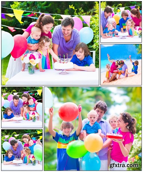 Happy family at birthday party - Stock Photo Happy family at birthday party - Stock Photo