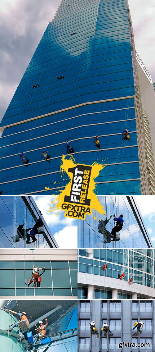 Stock Photo Three climbers wash windows and glass facade of the skyscraper