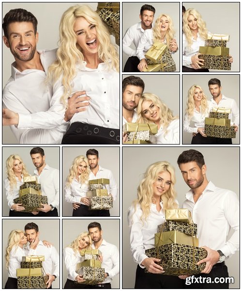 Beautiful young couple with presents - Stock Photo Beautiful young couple with presents - Stock Photo
