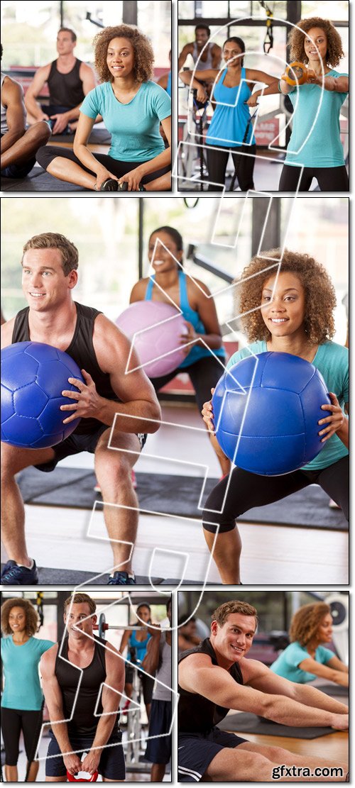 Group exercising in a gym - Stock photo