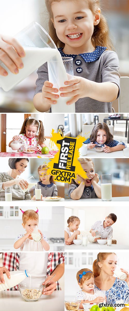 Stock Photo Happy family mother and baby daughter child girl at breakfast biscuits with milk